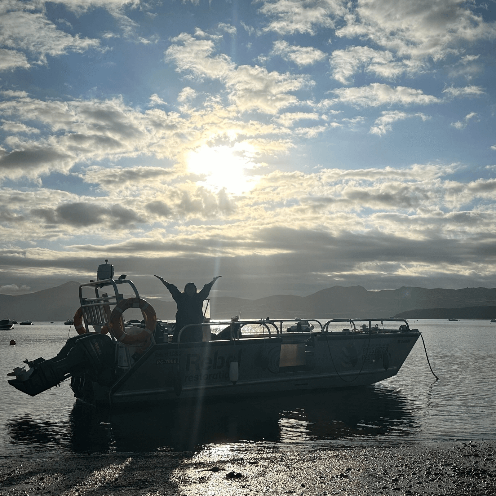 Gwen (Project Seagrass' vessel) is in the sea at Porthdinllaen beach.