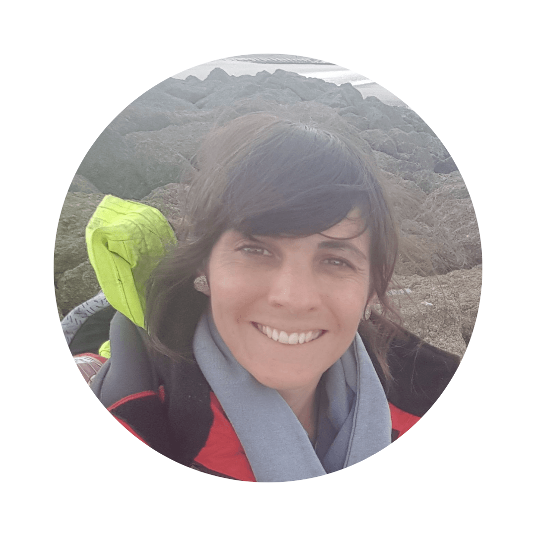 Ally Evans on a rocky beach